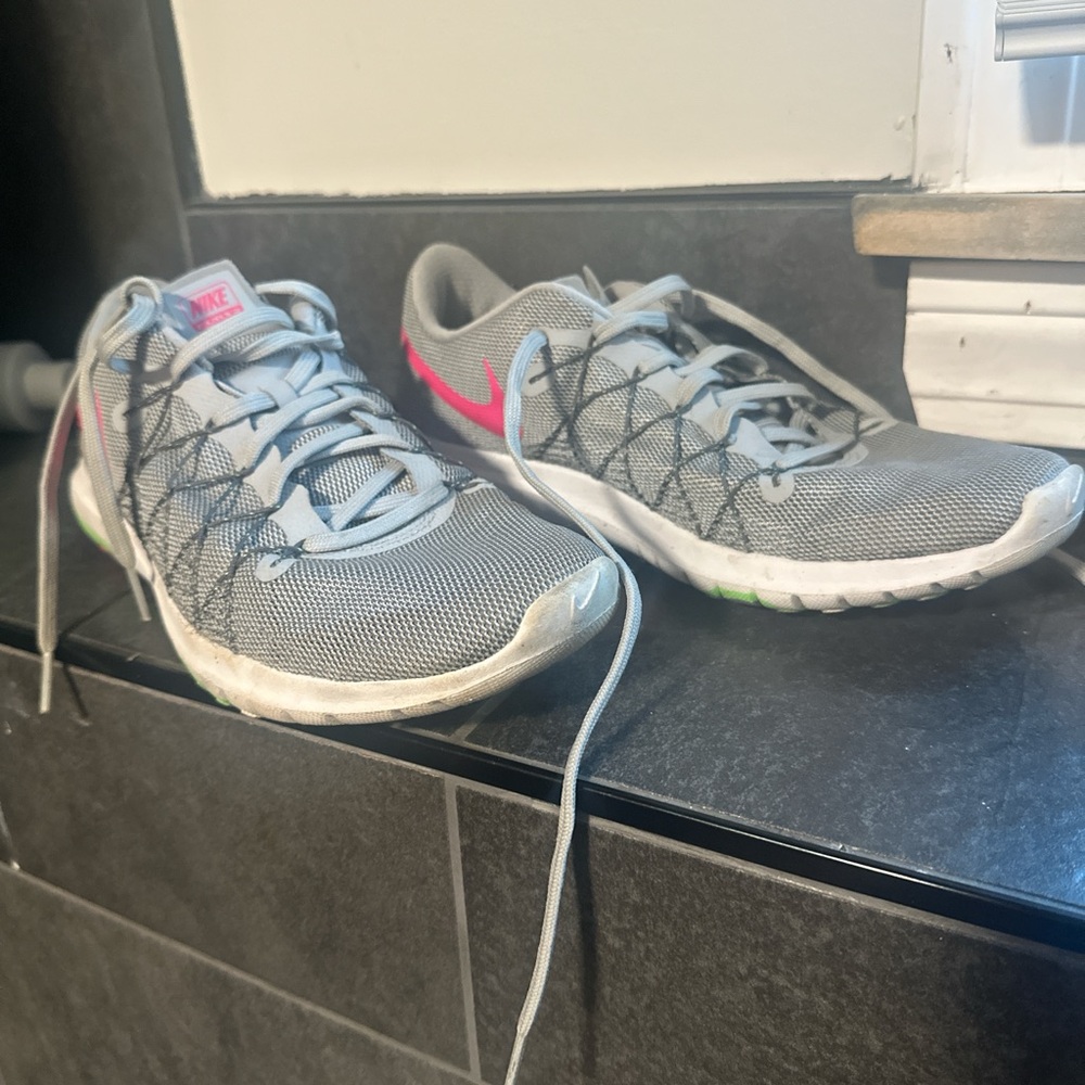Nike Women's Gray Athletic Shoes with Pink Details